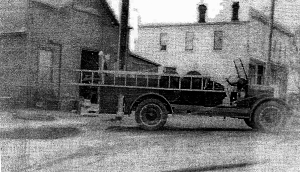Troy Center Volunteer Fire Department organized 1914, shown by Carl Huths Blacksmith Shop 